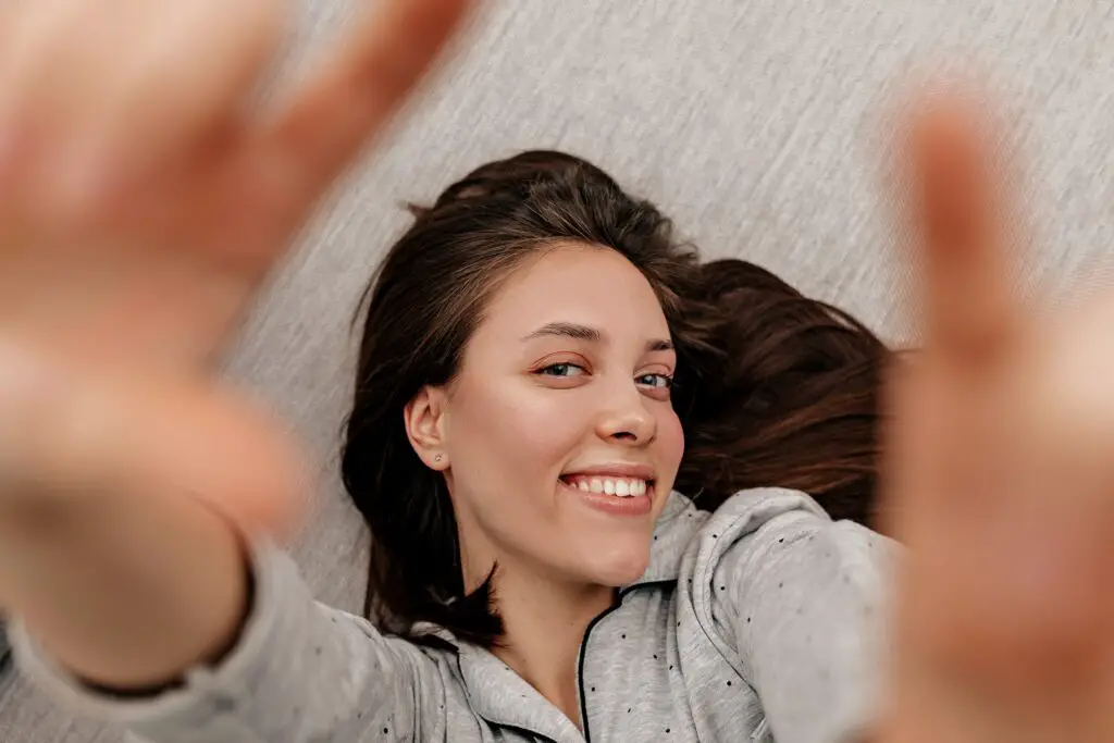 happy lovable girl with dark hair wearing pajamas 2021 08 31 22 18 43 utc